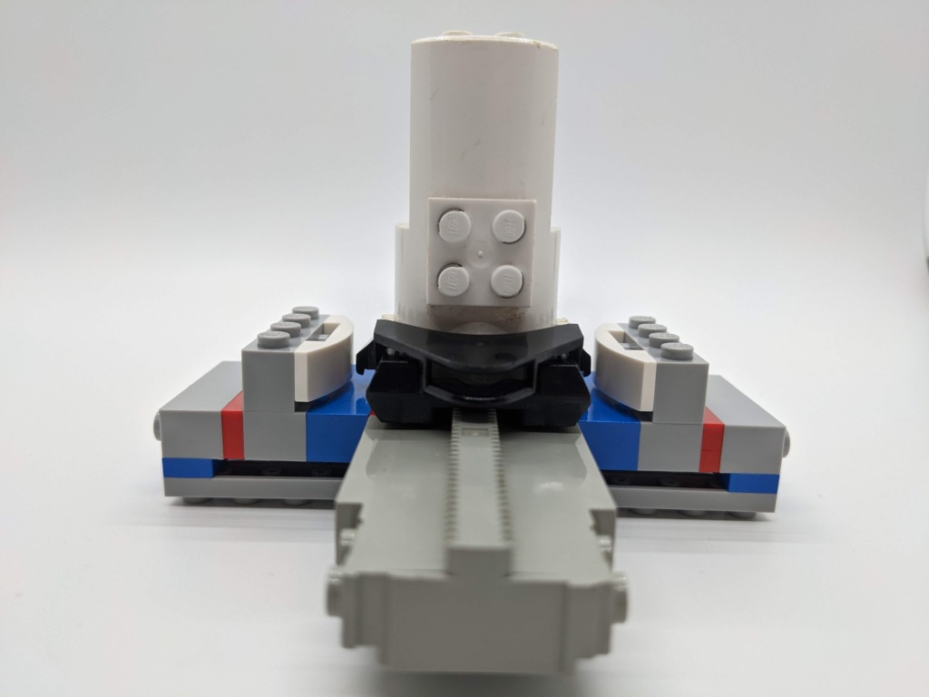 Custom monorail stop device